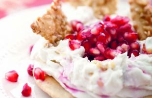 Dessert of White Cream with Pomegranate and Crispy Walnut